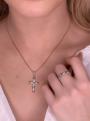 Подвеска-крест из родированного серебра с фианитами и золочением