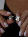 Серьги-пусеты из серебра с жемчугом Swarovski и фианитами родированные - Паучки