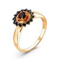 Кольцо из золочёного серебра с нат.гранатом, фианитами и родированием