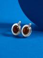Серьги из серебра с натуральным прессованным янтарём родированные