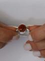 Кольцо из серебра с натуральным янтарём родированное