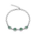 Браслет из серебра с изумрудом и кубическим цирконием родированный
