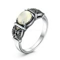 Кольцо из чернёного серебра с натуральным перламутром и марказитами