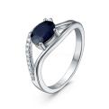 Кольцо из серебра с сапфиром и кубическим цирконием родированное
