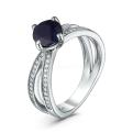 Кольцо из серебра с сапфиром и кубическим цирконием родированное