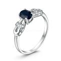 Кольцо из серебра с сапфиром и кубическим цирконием родированное