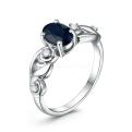 Кольцо из серебра с сапфиром и кубическим цирконием родированное