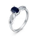 Кольцо из серебра с сапфиром и кубическим цирконием родированное