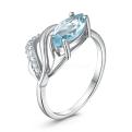 Кольцо из серебра с топазом и кубическим цирконием родированное