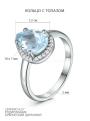 Кольцо из серебра с голубым топазом и кубическим цирконием родированное