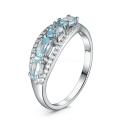 Кольцо из серебра с топазом и кубическим цирконием родированное