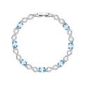 Браслет из серебра с голубым топазом и кубическим цирконием родированный