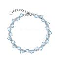 Браслет из серебра с голубым топазом и кубическим цирконием родированный