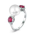 Кольцо из серебра с культивированным жемчугом, синтетическим рубином и фианитами родированное