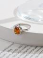 Кольцо из серебра с коньячным янтарём родированное