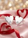 Серьги из серебра с фианитами родированные - Сердца
