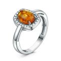 Кольцо из серебра с янтарём и фианитами родированное