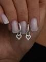 Серьги с сердцами из серебра с фианитами родированные