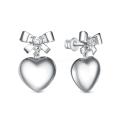 Серьги-пусеты из серебра с фианитами родированные - Сердца, банты
