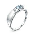 Кольцо из серебра с топазом и фианитами родированное