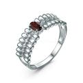 Кольцо из серебра с гранатом и фианитами родированное