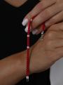 Браслет красный текстильный с подвижными элементами из чернёного серебра - Спаси и сохрани