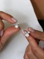 Серьги-пусеты из серебра с жемчугом Swarovski и фианитами родированные - Бантики