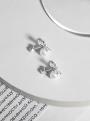 Серьги-пусеты из серебра с жемчугом Swarovski и фианитами родированные - Бантики