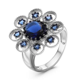 Кольцо из серебра с  пл. кварцем цв. сапфир и фианитами родированное