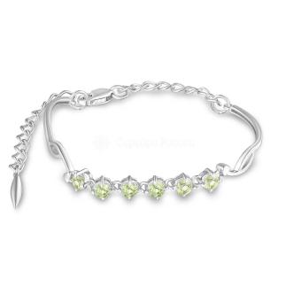 Браслет жёсткий из серебра с натуральным хризолитом родированный