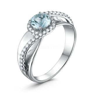 Кольцо из серебра с натуральным sky топазом и фианитами родированное
