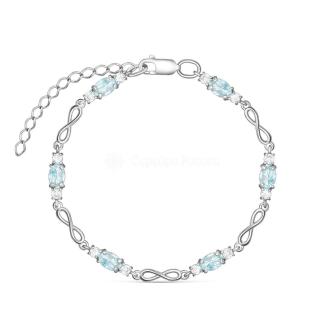 Браслет из родированного серебра с топазом и фианитами