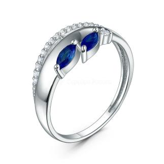Кольцо из серебра с синтетическим сапфиром и фианитами родированное