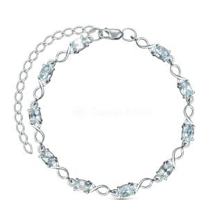 Браслет из серебра с sky топазом родированный