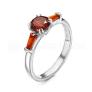 Кольцо из серебра с фианитами цвета гранат родированное