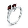 Кольцо из серебра с натуральным гранатом и фианитами родированное