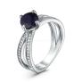 Кольцо из серебра с сапфиром и кубическим цирконием родированное